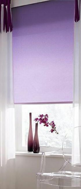 Рулонные шторы в спальне